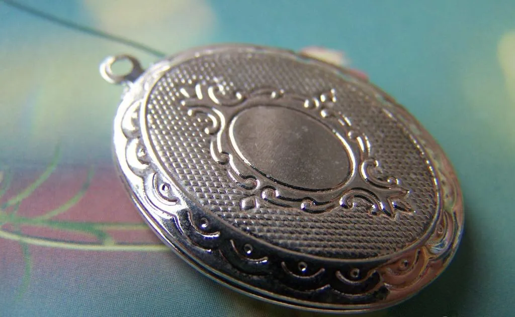 4 pcs of Silver Tone Brass Cross Oval Flat Photo Locket A3553