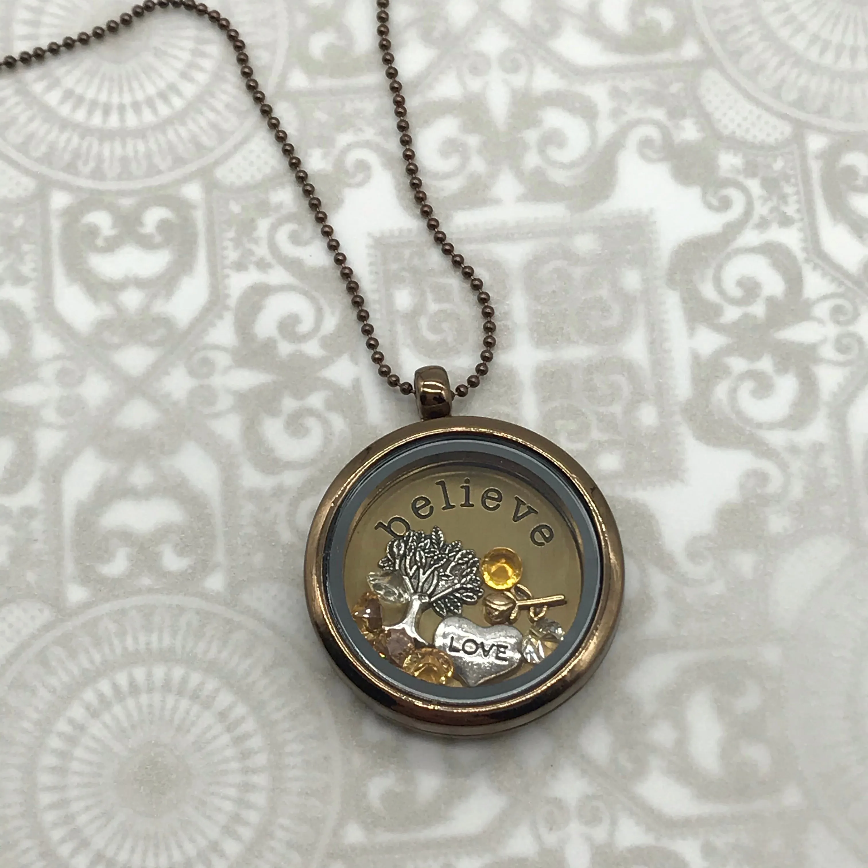 Bronze Believe Memory Locket with Topaz Cubic Zirconia