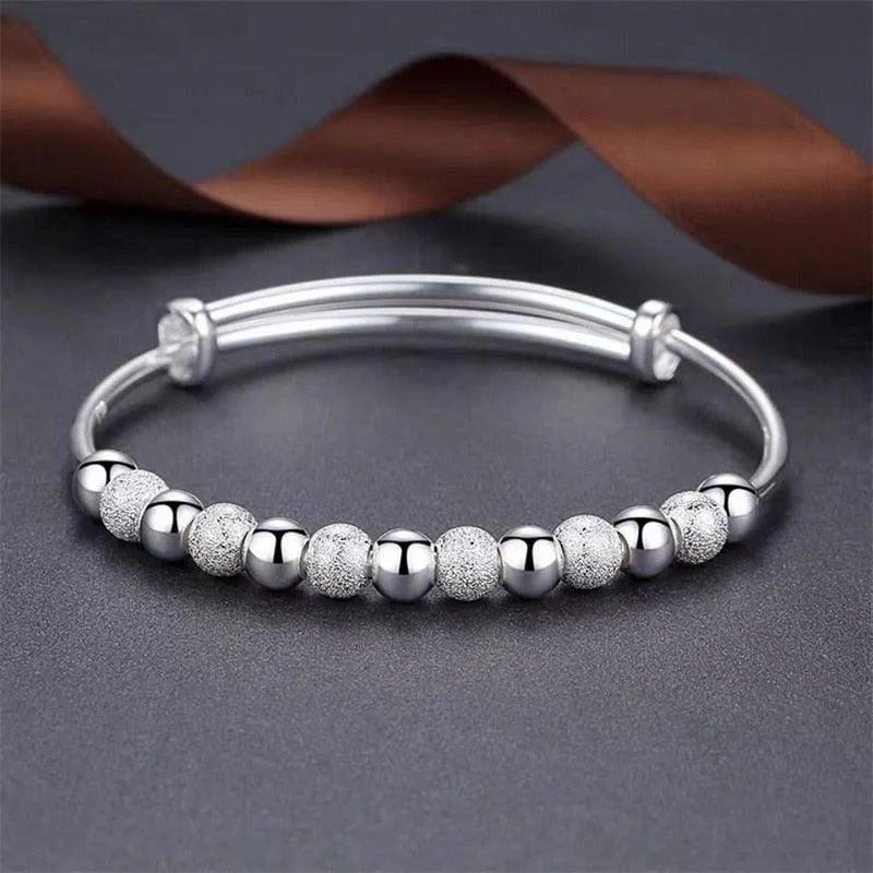 SILVER CHARM BANGLE BRACELET
