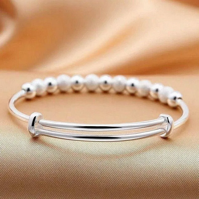SILVER CHARM BANGLE BRACELET