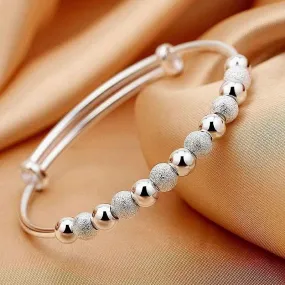 SILVER CHARM BANGLE BRACELET