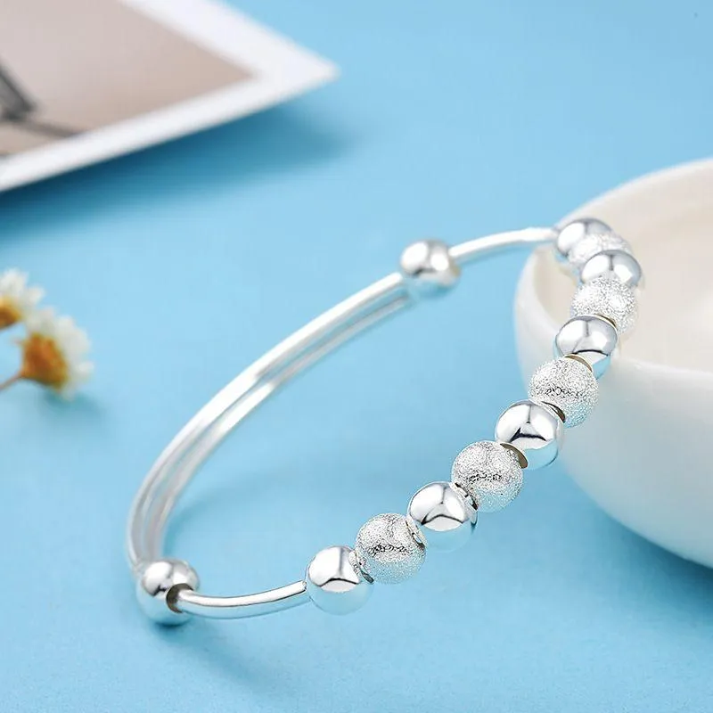 SILVER CHARM BANGLE BRACELET